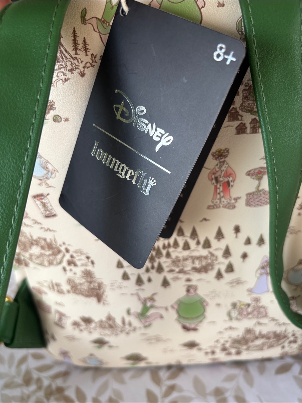 Disney Cream Mini Backpack with Green Trim and Storybook Print - Picture 2 of 3